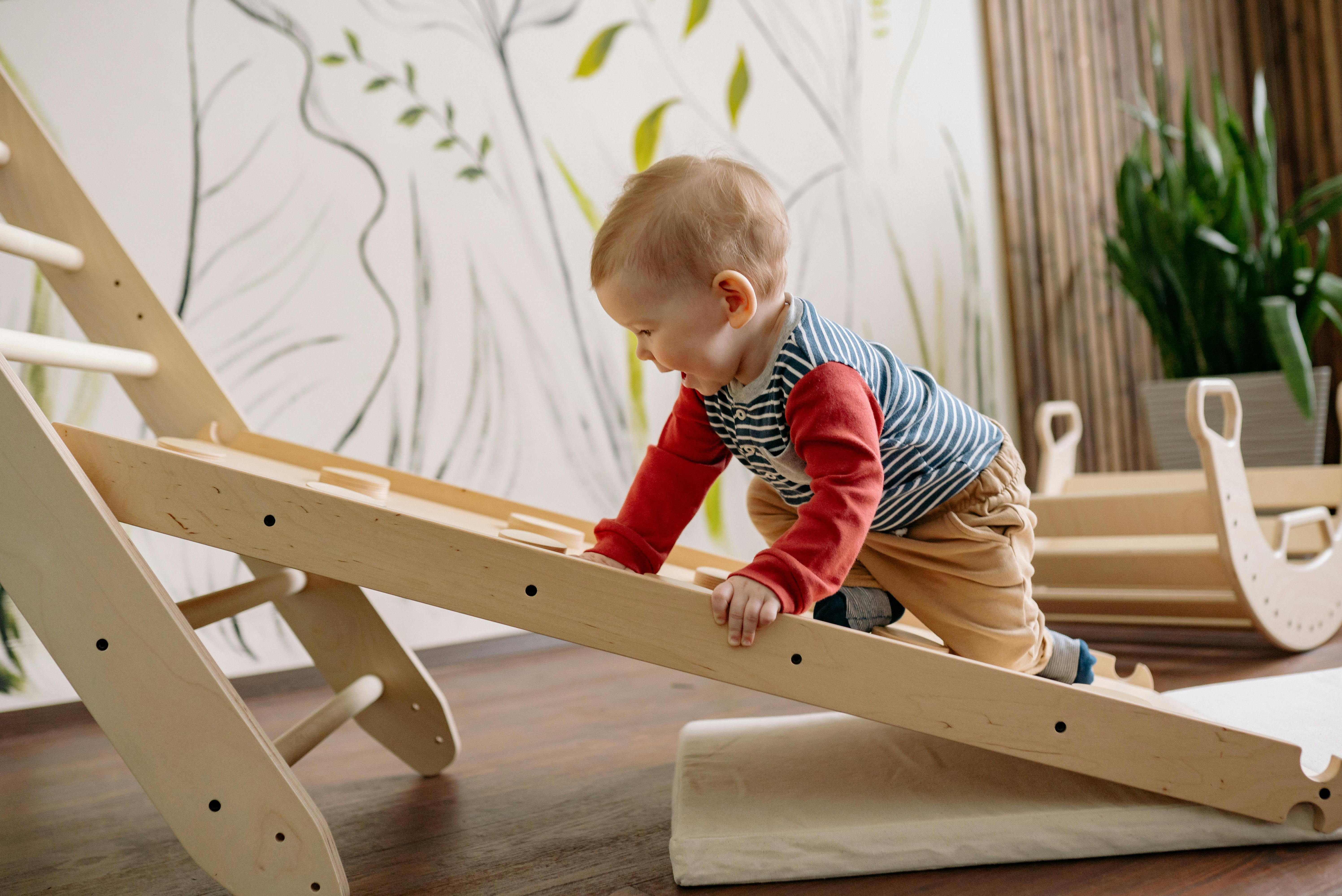 cropped-toddler-climbing.png